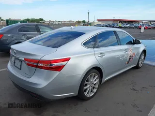 2014 Toyota Avalon Limited with VIN 4T1BK1EB0EU114837, listed as a IAAI auction lot 40051759 with 92,379 mi miles and . Bid and sale history available at DreamBid. Image 4.