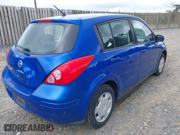 2009 Nissan Versa 1.8 S with VIN 3N1BC13E79L425943, listed as a IAAI auction lot 42198557 with 217,059 mi miles. Bid and sale history available at carsss.com. Image 4.