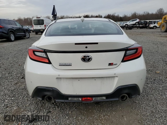 2023 Toyota GR86 with VIN JF1ZNBC17P8761781, listed as a Copart auction lot 80765984 with 8,717 mi miles and Salvage Title. Bid and sale history available at carsss.com. Image 6.