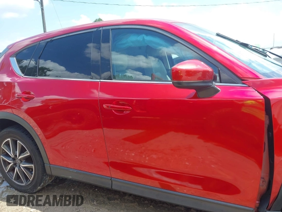 2018 Mazda CX-5 Grand Touring with VIN JM3KFADM4J0335913, listed as a IAAI auction lot 42326044 with 104,583 mi miles and . Bid and sale history available at DreamBid. Image 14.