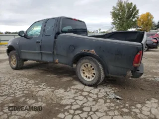 2001 Ford F-150 XL z VIN 1FTRX18W21KA55346, wystawiony jako Copart lot #79252584 z przebiegiem 347 300 mil mil oraz Szkoda całkowita • Salvage title. Historia ofert i sprzedaży dostępna na DreamBid. Obrazek 2.