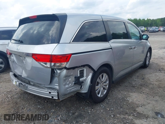 2015 Honda Odyssey EX-L with VIN 5FNRL5H68FB044259, listed as a IAAI auction lot 42127227 with 143,902 mi miles and . Bid and sale history available at DreamBid. Image 4.