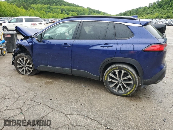 2022 Toyota Corolla Cross XLE with VIN 7MUDAABGXNV042443, listed as a Copart auction lot 57808565 with 102,887 mi miles and Salvage title. Bid and sale history available at DreamBid. Image 2.