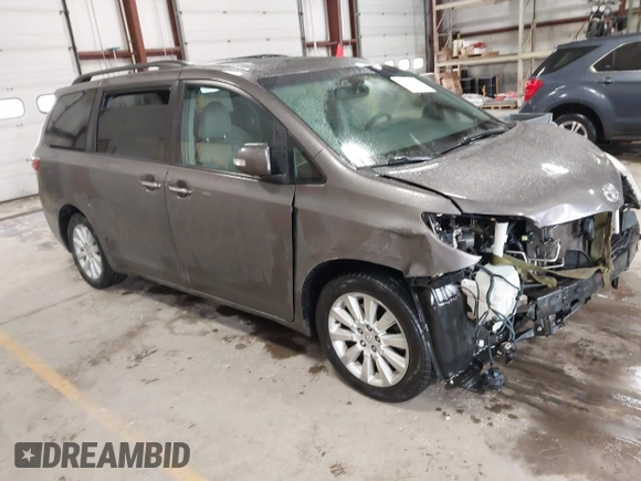 2015 Toyota Sienna Ltd with VIN 5TDDK3DC3FS106157, listed as a IAAI auction lot 41737202 with 173,724 mi miles. Bid and sale history available at carsss.com. Image 1.