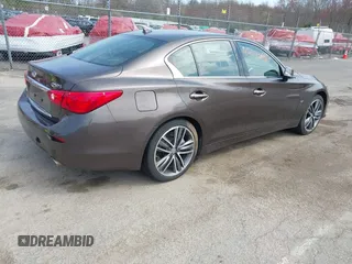 2014 Infiniti Q50 Premium z VIN JN1BV7AR0EM687810, wystawiony jako IAAI lot #42073610 z przebiegiem 167 912 mil mil oraz . Historia ofert i sprzedaży dostępna na DreamBid. Obrazek 4.