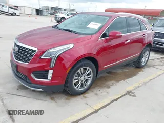 2020 Cadillac XT5 Premium Luxury FWD z VIN 1GYKNCRS8LZ228516, wystawiony jako IAAI lot #42409513 z przebiegiem 54 765 mil mil oraz . Historia ofert i sprzedaży dostępna na DreamBid. Obrazek 2.