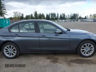 2018 BMW 3 Series 320i xDrive with VIN WBA8E5G53JNV03333, listed as a IAAI auction lot 42018275 with 45,950 mi miles. Bid and sale history available at carsss.com. Image 13.