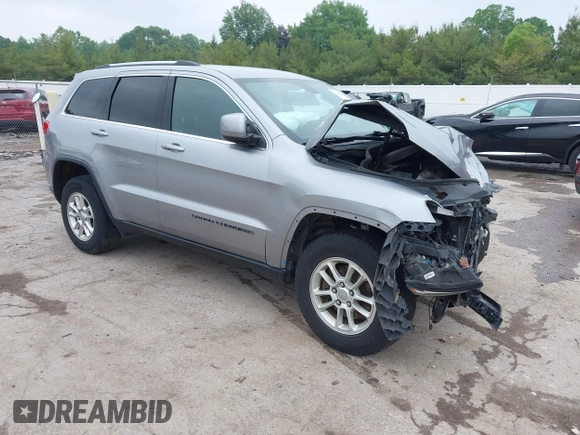 2018 Jeep Grand Cherokee Laredo z VIN 1C4RJFAG0JC129021, wystawiony jako IAAI lot #42413165 z przebiegiem 103 743 mil mil oraz . Historia ofert i sprzedaży dostępna na DreamBid. Obrazek 1.