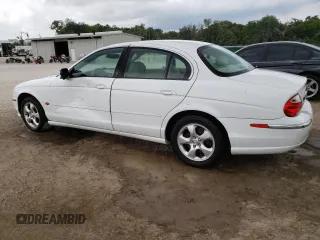 2000 Jaguar S-Type V6 z VIN SAJDA01C0YFL51640, wystawiony jako Copart lot #48708915 z przebiegiem 186 034 mil mil oraz Nie do naprawy • Non repairable. Historia ofert i sprzedaży dostępna na DreamBid. Obrazek 2.