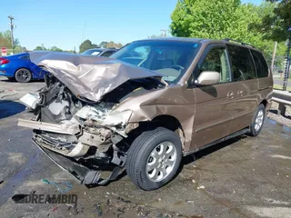 2003 Honda Odyssey EX-L z VIN 5FNRL180X3B055800, wystawiony jako IAAI lot #42053575 z przebiegiem 203 398 mil mil oraz . Historia ofert i sprzedaży dostępna na DreamBid. Obrazek 17.