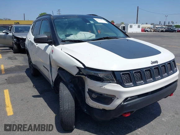 2020 Jeep Compass Trailhawk z VIN 3C4NJDDB5LT248662, wystawiony jako IAAI lot #42574553 z przebiegiem 28 118 mil mil oraz . Historia ofert i sprzedaży dostępna na DreamBid. Obrazek 1.