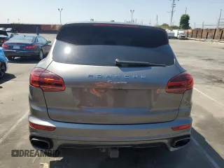 2016 Porsche Cayenne z VIN WP1AA2A22GKA08076, wystawiony jako Copart lot #55059565 z przebiegiem 71 521 mil mil oraz Szkoda całkowita • Salvage title. Historia ofert i sprzedaży dostępna na DreamBid. Obrazek 6.