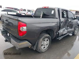 2014 Toyota Tundra SR5 z VIN 5TFEM5F16EX082421, wystawiony jako IAAI lot #40735426 z przebiegiem 173 005 mil mil oraz . Historia ofert i sprzedaży dostępna na DreamBid. Obrazek 4.