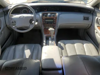 2000 Toyota Avalon XL with VIN 4T1BF28B5YU031947, listed as a Copart auction lot 56239265 with 167,627 mi miles and Salvage title. Bid and sale history available at DreamBid. Image 8.
