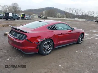 2015 Ford Mustang EcoBoost with VIN 1FA6P8TH6F5357867, listed as a IAAI auction lot 42011136 with 58,099 mi miles and . Bid and sale history available at carsss.com. Image 4.