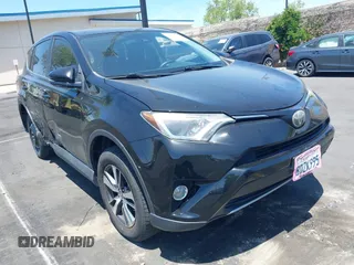 2018 Toyota RAV4 XLE z VIN 2T3WFREV1JW450514, wystawiony jako IAAI lot #42291018 z przebiegiem 89 370 mil mil oraz . Historia ofert i sprzedaży dostępna na DreamBid. Obrazek 1.