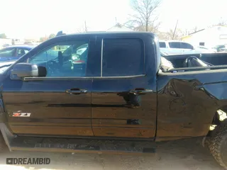 2018 Chevrolet Silverado 1500 LT with VIN 1GCVKREC9JZ256948, listed as a IAAI auction lot 41828882 with 63,209 mi miles. Bid and sale history available at carsss.com. Image 14.