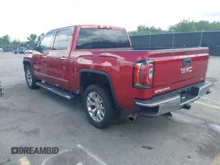2018 GMC Sierra 1500 SLT z VIN 3GTU2NEC8JG600189, wystawiony jako IAAI lot #42241579 z przebiegiem 174 506 mil mil oraz . Historia ofert i sprzedaży dostępna na DreamBid. Obrazek 3.