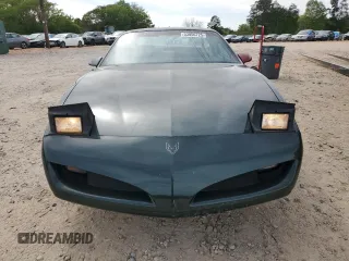 1991 Pontiac Firebird z VIN 1G2FS23T9ML201636, wystawiony jako Copart lot #53856725 z przebiegiem 1 278 739 mil mil oraz Czysty tytuł • Clean title. Historia ofert i sprzedaży dostępna na DreamBid. Obrazek 5.