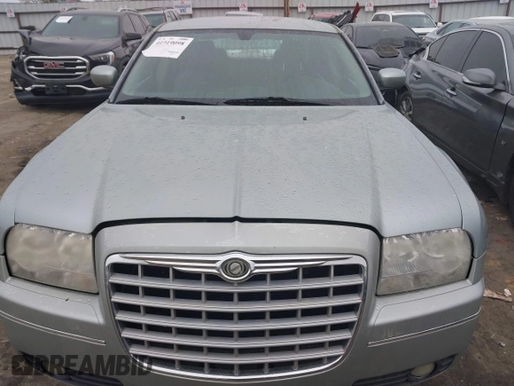2006 Chrysler 300 Touring with VIN 2C3KA53G56H112376, listed as a IAAI auction lot 41919098 with 309,184 mi miles. Bid and sale history available at carsss.com. Image 12.