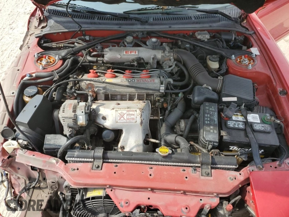 1990 Toyota Celica GTS z VIN JT2ST85N1L0018233, wystawiony jako Copart lot #56499394 z przebiegiem 180 549 mil mil oraz Szkoda całkowita • Salvage title. Historia ofert i sprzedaży dostępna na DreamBid. Obrazek 13.