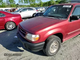 2000 Ford Explorer XLS z VIN 1FMZU72X7YUB64053, wystawiony jako Copart lot #53037485 z przebiegiem 197 312 mil mil oraz Szkody całkowita. Historia ofert i sprzedaży dostępna na DreamBid. Obrazek 12.