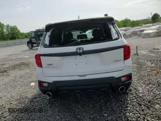 2023 Honda Passport EX-L with VIN 5FNYF8H58PB024039, listed as a Copart auction lot 57269725 with 44,705 mi miles and Salvage title. Bid and sale history available at DreamBid. Image 14.