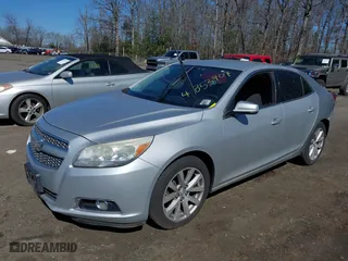 2013 Chevrolet Malibu LT with VIN 1G11E5SA9DF332443, listed as a IAAI auction lot 41853909 with 269,618 mi miles. Bid and sale history available at carsss.com. Image 2.