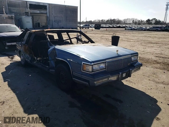1988 Cadillac DeVille z VIN 1G6CD1156J4296091, wystawiony jako Copart lot #46307265 z przebiegiem Nie podano mil oraz Szkoda całkowita • Salvage title. Historia ofert i sprzedaży dostępna na DreamBid. Obrazek 11.