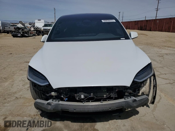 2022 Tesla Model X with VIN 7SAXCBE52NF362994, listed as a Copart auction lot 49850475 with 55,506 mi miles and Salvage Title. Bid and sale history available at DreamBid. Image 5.