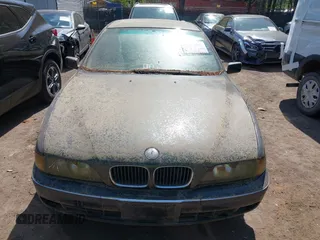 1997 BMW 5 Series 528iA with VIN WBADD6329VBW04841, listed as a IAAI auction lot 42038507 with 147,762 mi miles. Bid and sale history available at carsss.com. Image 6.
