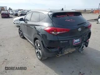 2018 Hyundai Tucson Sport with VIN KM8J33AL7JU772152, listed as a IAAI auction lot 41285203 with 87,188 mi miles. Bid and sale history available at carsss.com. Image 3.