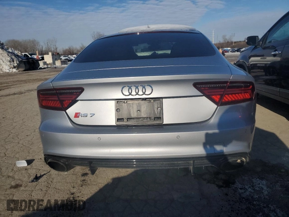 2017 Audi RS 7 Prestige z VIN WUAWAAFC8HN903853, wystawiony jako Copart lot #86112964 z przebiegiem 57 313 mil mil oraz Szkody całkowita. Historia ofert i sprzedaży dostępna na DreamBid. Obrazek 6.