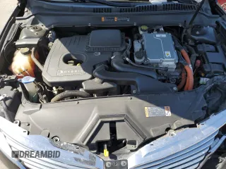 2015 Lincoln MKZ Hybrid z VIN 3LN6L2LU4FR618647, wystawiony jako Copart lot #58937985 z przebiegiem 113 765 mil mil oraz Szkoda całkowita • Salvage title. Historia ofert i sprzedaży dostępna na DreamBid. Obrazek 11.