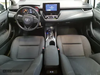 2023 Toyota Corolla LE with VIN 5YFB4MDE5PP056428, listed as a Copart auction lot 52189695 with 56,715 mi miles and Clean Title. Bid and sale history available at carsss.com. Image 8.