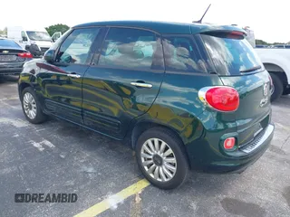 2014 FIAT 500L Easy with VIN ZFBCFABH0EZ014538, listed as a IAAI auction lot 42552809 with 97,225 mi miles and . Bid and sale history available at DreamBid. Image 3.