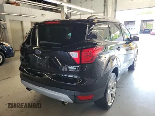 2019 Ford Escape Titanium with VIN 1FMCU9J96KUA01051, listed as a IAAI auction lot 42841649 with 69,720 mi miles and . Bid and sale history available at DreamBid. Image 12.