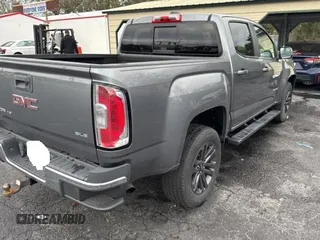 2020 GMC Canyon 2WD SLE with VIN 1GTG5CEN1L1248228, listed as a Copart auction lot 89388675 with 31,980 mi miles and Salvage Title. Bid and sale history available at carsss.com. Image 4.