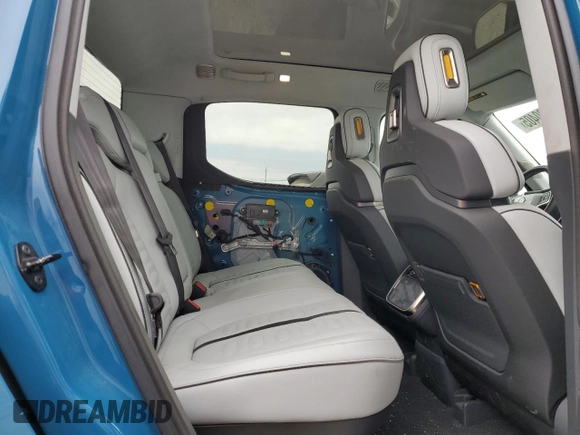 2023 Rivian R1T Launch Edition with VIN 7FCTGAAL7PN019188, listed as a Copart auction lot 55100405 with 13,654 mi miles and Salvage Title. Bid and sale history available at DreamBid. Image 10.