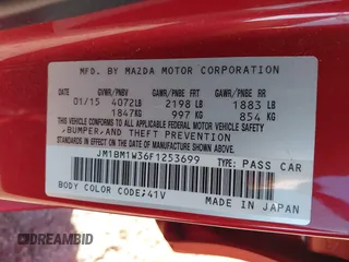 2015 Mazda 3 S Grand Touring z VIN JM1BM1W36F1253699, wystawiony jako IAAI lot #42204557 z przebiegiem 132 626 mil mil oraz . Historia ofert i sprzedaży dostępna na DreamBid. Obrazek 9.