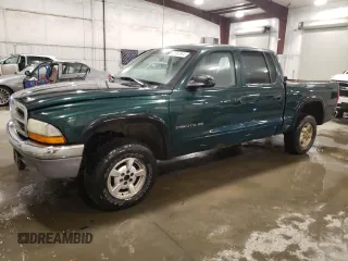 2002 Dodge Dakota SLT with VIN 1B7HG48N42S725145, listed as a Copart auction lot 82690584 with 159,161 mi miles and Salvage Title. Bid and sale history available at carsss.com. Image 1.