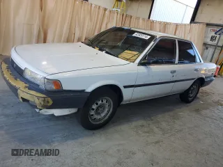 1991 Toyota Camry z VIN 4T1SV24E0MU402588, wystawiony jako Copart lot #82920114 z przebiegiem 124 644 mil mil oraz Szkoda całkowita • Salvage title. Historia ofert i sprzedaży dostępna na DreamBid. Obrazek 1.