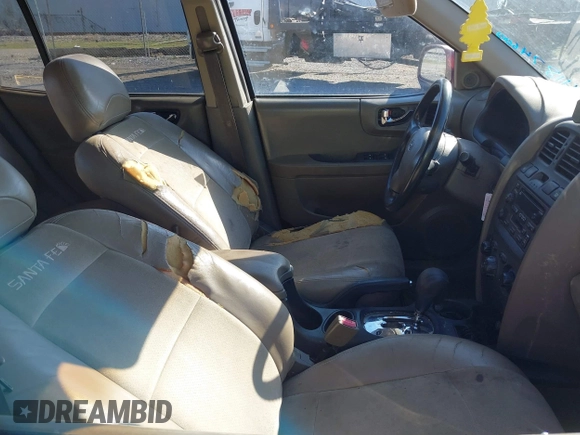 2004 Hyundai Santa Fe GLS with VIN KM8SC13D14U777995, listed as a IAAI auction lot 41874600 with 240,241 mi miles. Bid and sale history available at carsss.com. Image 5.
