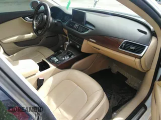 2016 Audi A7 3.0 Premium Plus with VIN WAUWGAFC6GN144188, listed as a IAAI auction lot 41824927 with 128,379 mi miles. Bid and sale history available at carsss.com. Image 5.