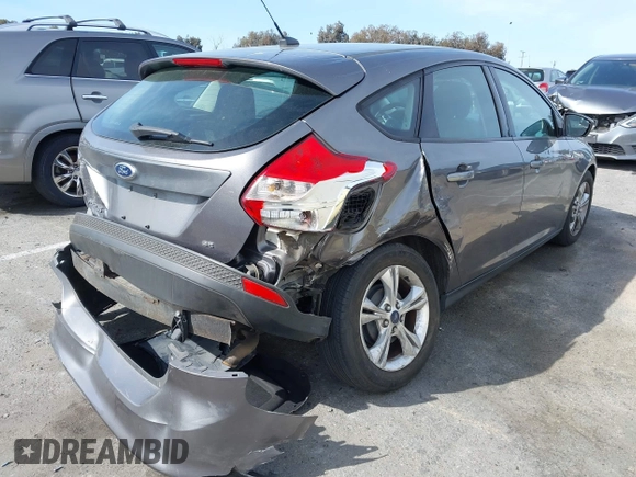 2013 Ford Focus SE with VIN 1FADP3K26DL245456, listed as a IAAI auction lot 41916229 with 164,737 mi miles and . Bid and sale history available at DreamBid. Image 4.