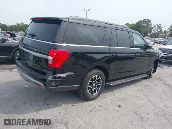 2023 Ford Expedition Max XLT with VIN 1FMJK1J81PEA03636, listed as a IAAI auction lot 42214363 with 77,017 mi miles and . Bid and sale history available at DreamBid. Image 4.