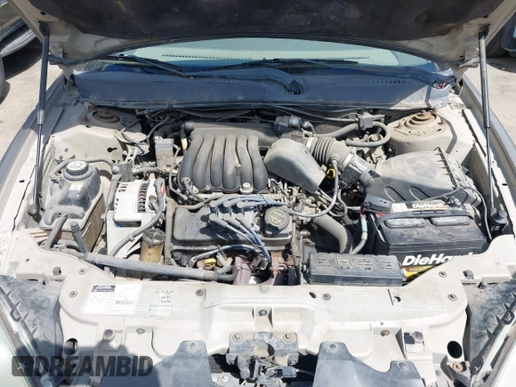 2002 Ford Taurus z VIN 1FAHP59U52G115825, wystawiony jako IAAI lot #41904552 z przebiegiem 91 004 mil mil oraz . Historia ofert i sprzedaży dostępna na DreamBid. Obrazek 10.