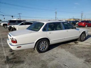2001 Jaguar XJ with VIN SAJDA23C51LF35586, listed as a Copart auction lot 44105165 with 47,355 mi miles and Salvage title. Bid and sale history available at DreamBid. Image 3.