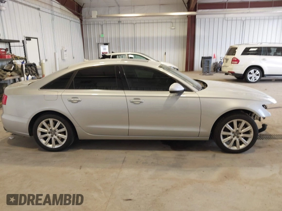 2015 Audi A6 Premium z VIN WAUFFAFC3FN021983, wystawiony jako IAAI lot #42105719 z przebiegiem 104 143 mil mil oraz . Historia ofert i sprzedaży dostępna na DreamBid. Obrazek 14.