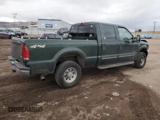 2000 Ford F-250 XL with VIN 1FTNW21F5YEB21513, listed as a Copart auction lot 82013464 with 383,819 mi miles and Salvage title. Bid and sale history available at DreamBid. Image 3.